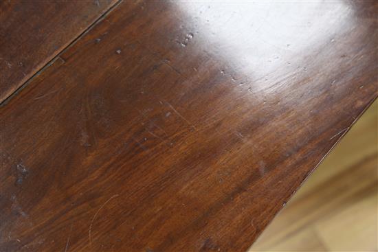 A George III mahogany drop leaf spider leg table, extended W.3ft